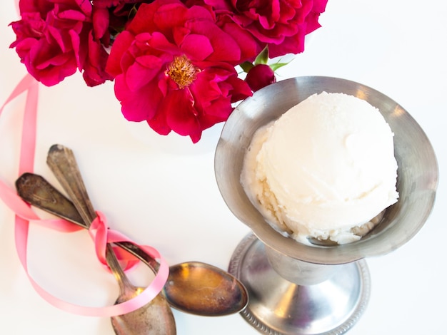 Scoop of delicious Italian fresh ice cream on white background.