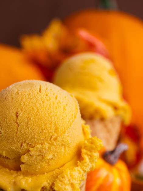 Scoop of gourmet pumpkin gelato in waffle cones.