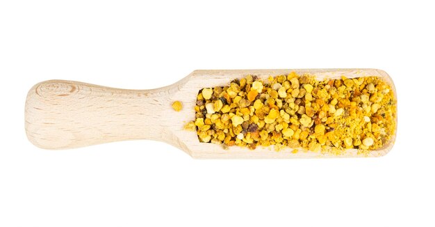Photo scoop with portion of natural bee pollen isolated