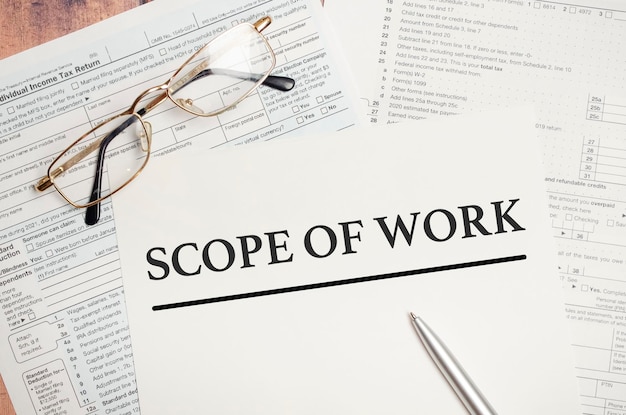 Scope Of Work Conceptual background with chart papers and pen