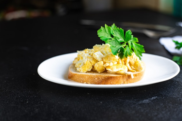 Scramble fried egg scrambled breakfast dish on the table healthy food