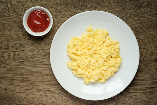 Scramble on a white plate with copy space