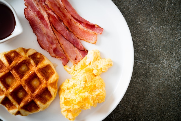 scrambled egg with bacon and waffle for breakfast