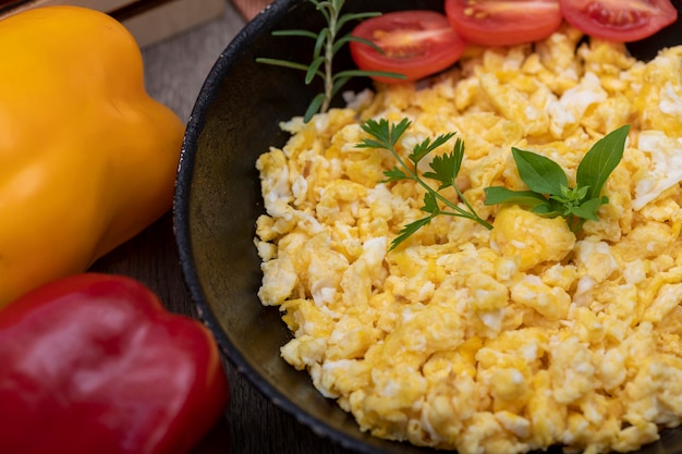 Scrambled eggs in metal pan