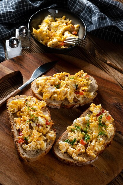 Premium Photo | Scrambled eggs on a slice of bread