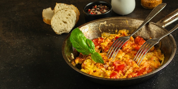 Scrambled eggs tomatoe, breakfast delicious and healthy, menu.\
food. copyspace