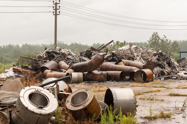 Scrap metal on the site is ready for recycling. An industrial facility for the collection and proces