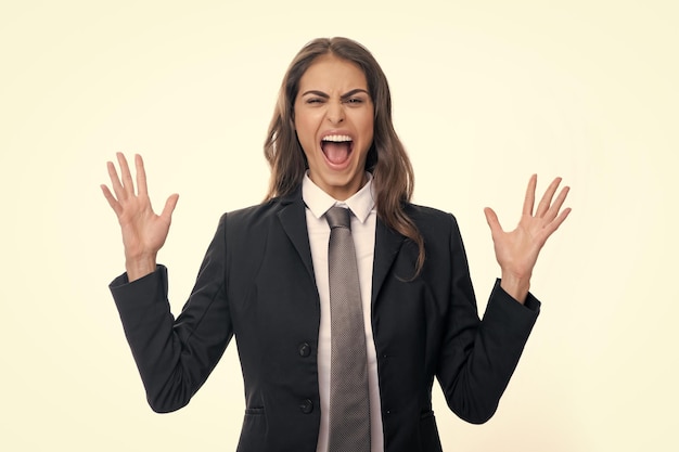 Screaming hate rage woman face Emotional angry woman screaming on studio isolated background Human emotions expressive facial expressions Panic and scream Female office worker success manager