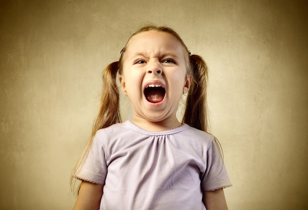 Photo screaming shouting little girl