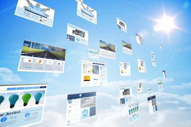 Screens showing business advertisement in blue sky