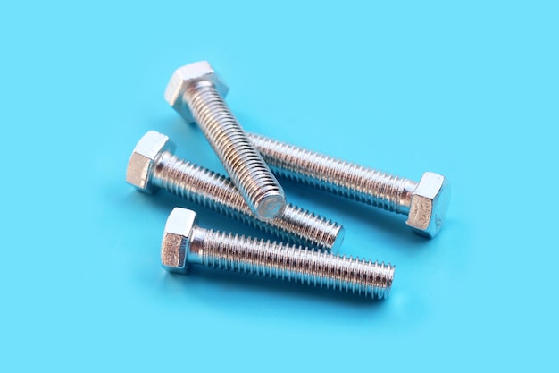 Screw isolated on blue background