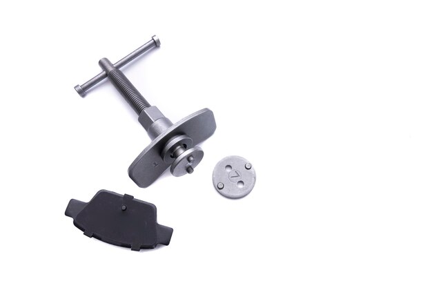 Screw tool to change brake disc accompanied by a brake pad Selective focus