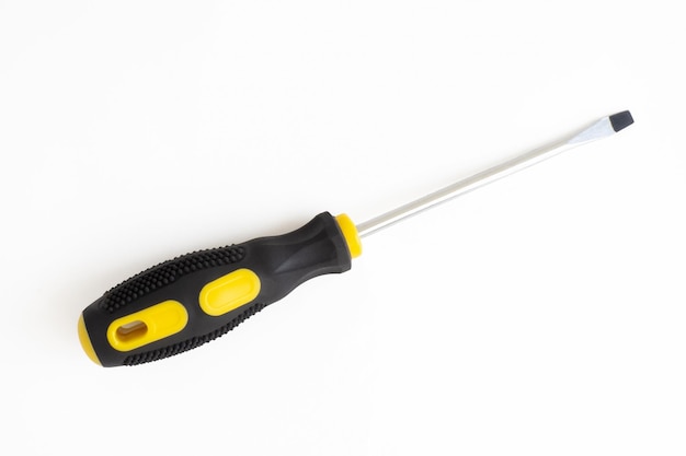 Screwdriver on a white background A working tool Repair and construction