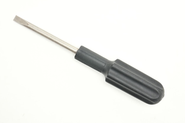 Screwdriver with a flat blade for repair work on an isolated white backgroundxDxA