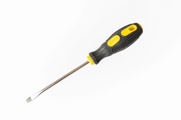 A screwdriver A working tool Flat screwdriver on a white background Repair and construction