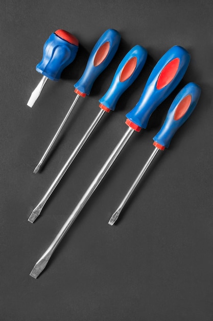 Screwdrivers on black background