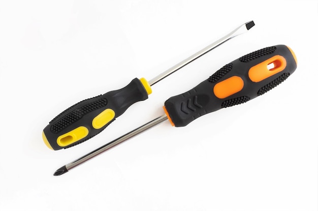 Screwdrivers on a white background Repair and construction A working tool