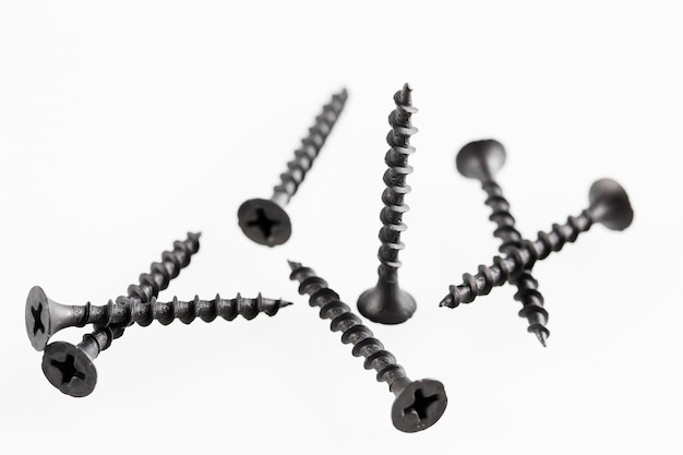 Screws still life large self tapping screws on white background.