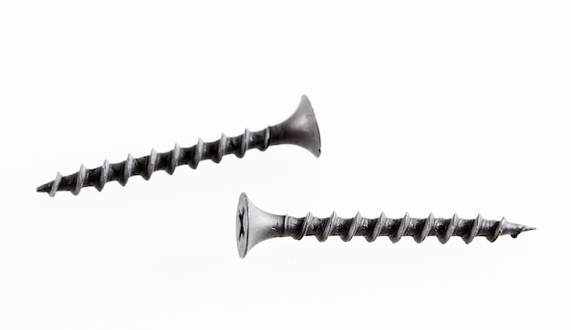 Screws still life large self tapping screws on white background.