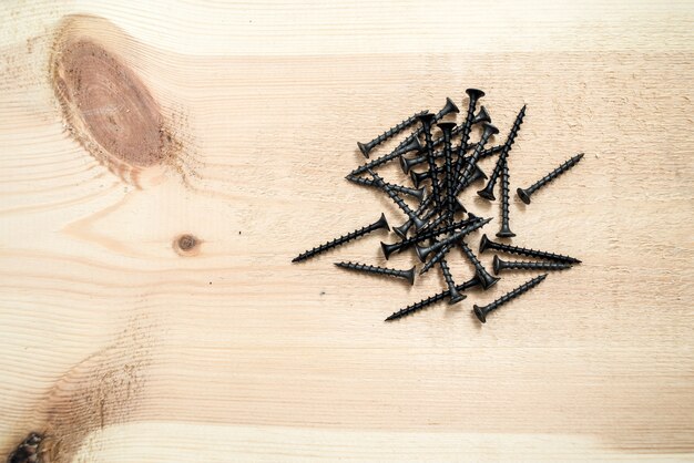 Screws on the wooden board