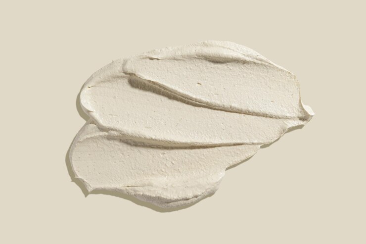 Photo scrub smear on a beige background beauty texture sample of a cosmetic product