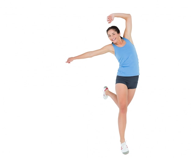 Sctive sporty young woman rejocing over white background