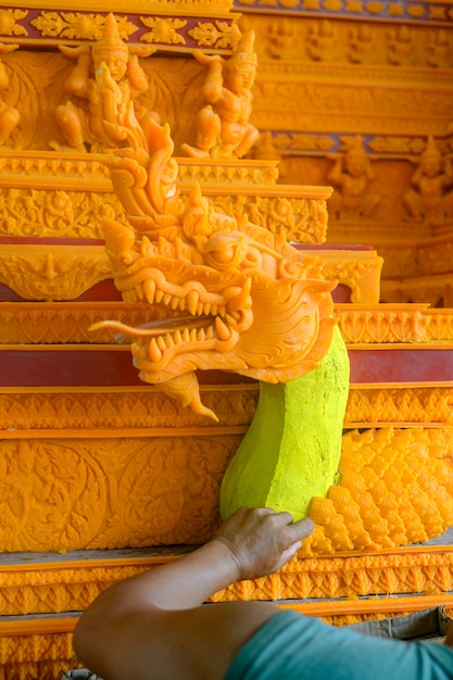 The sculptor was sticking with wax. To make wax castle  Join the wax castle parade festival in Sakon Nakhon,Thailand