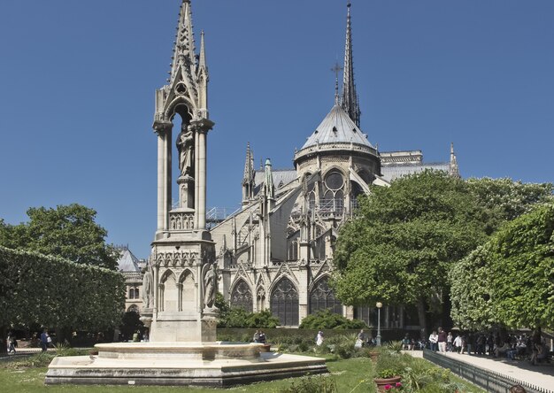 sculptural fountain of our lady behind notre dame de paris france 2018