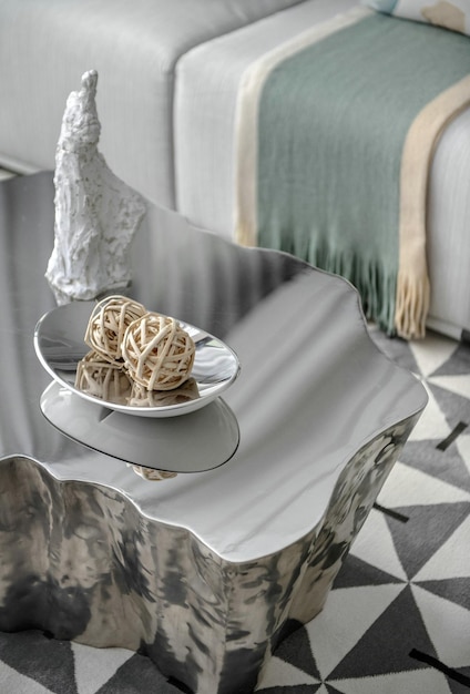 sculptural polished metal coffee table