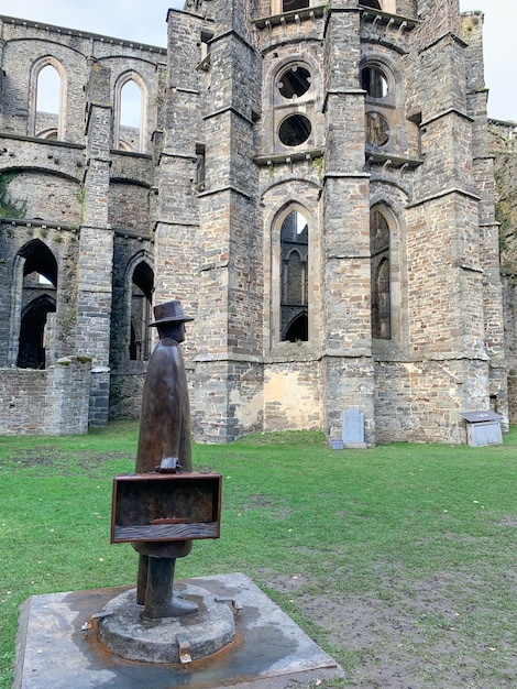 Sculpture from the artist JeanMichel Folon in the Abbey of VillersLaVille Belgium