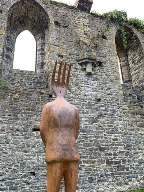 Sculpture from the artist JeanMichel Folon in the Abbey of VillersLaVille Belgium