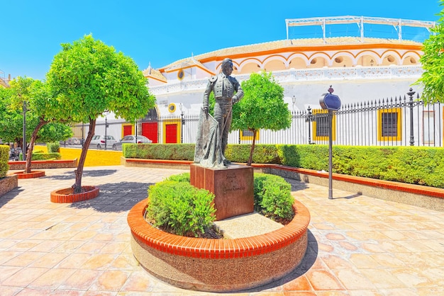 Sculpture near arena on of square of bulls royal maestranza of c