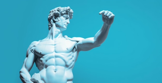 Sculpture or statue of david pointing and looking on a blue background