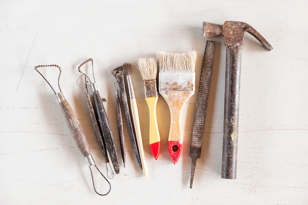 Photo sculpture tools. art and craft tools on a white background.