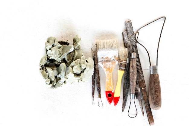 Sculpture tools set background. Art and craft tools on a white background.