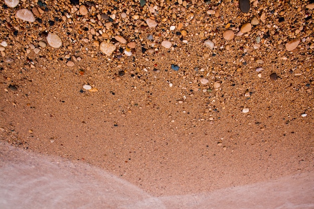 sea background of sand and small gravel for your design