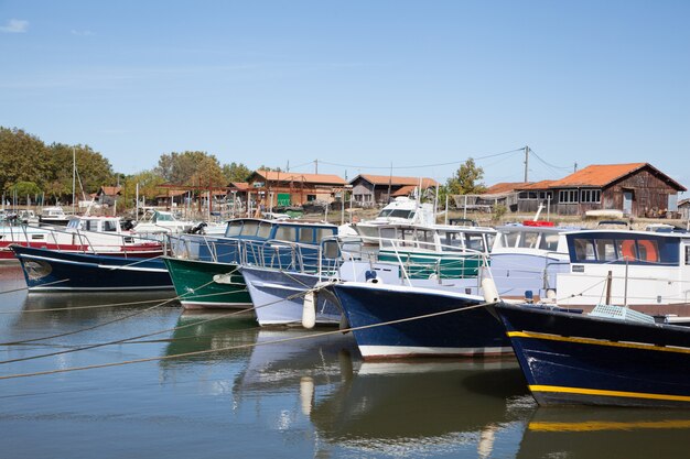 Sea bay with yachts and boat  in summer