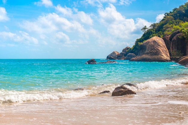 Sea beautiful landscape Azure sea and rocky shore on a tropical island on a sunny day Wallpaper vacation and travel concept