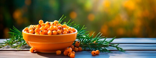 Sea buckthorn in a bowl against the backdrop of the garden Selective focus