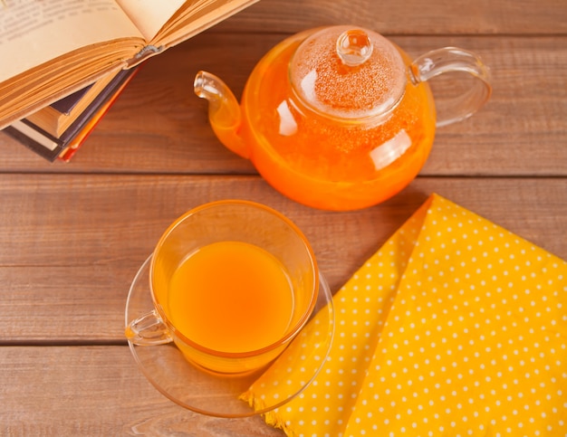 Sea buckthorn tea in a glass cup