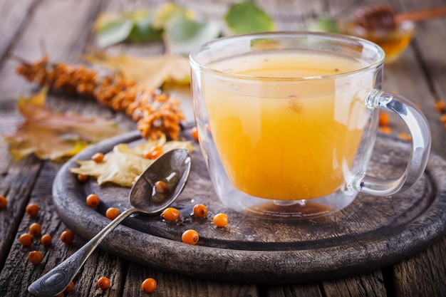 Sea buckthorn tea for health.Autumn still life
