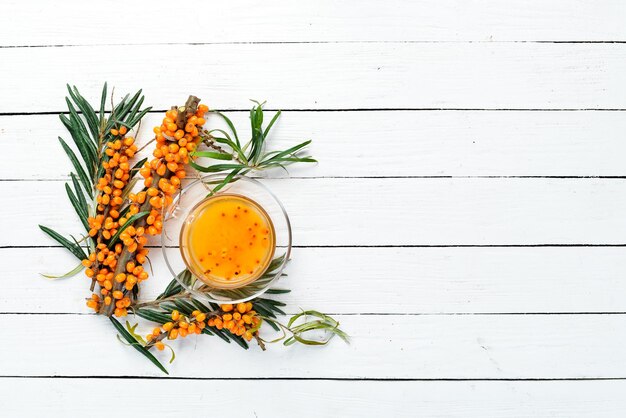 Sea buckthorn tea Winter hot drink Top view Free space for your text