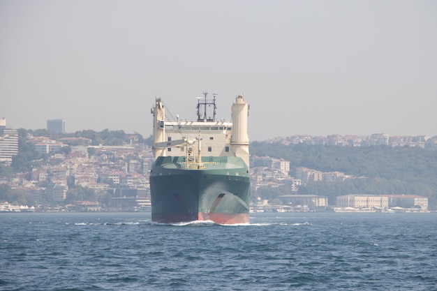 Sea cargo ship sailing on the waves