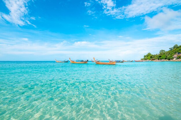 Sea and clear water beach have a holiday summer relaxing and travel bright sky koh lipe thailand