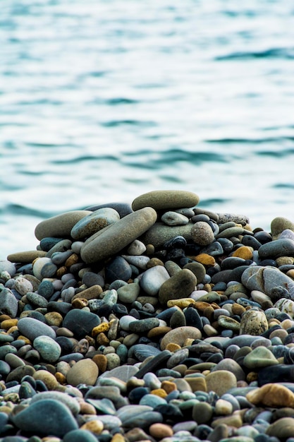 Sea behind gravel pebbles