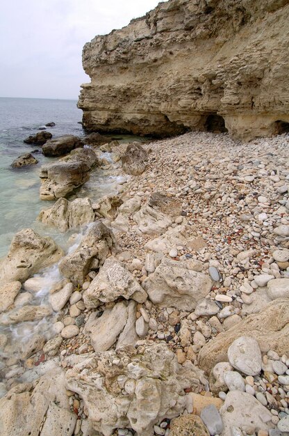 Sea landscape with a stone beach promenade