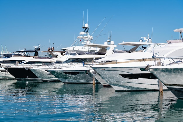 Sea reflecting sunlight at luxury motor yacht boats in South Beach USA