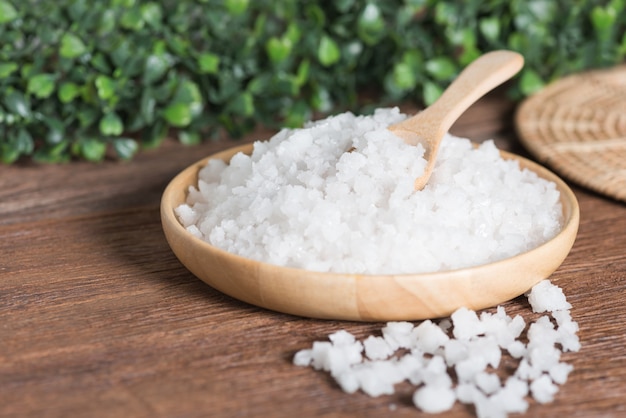 Sea salt in wood plate.