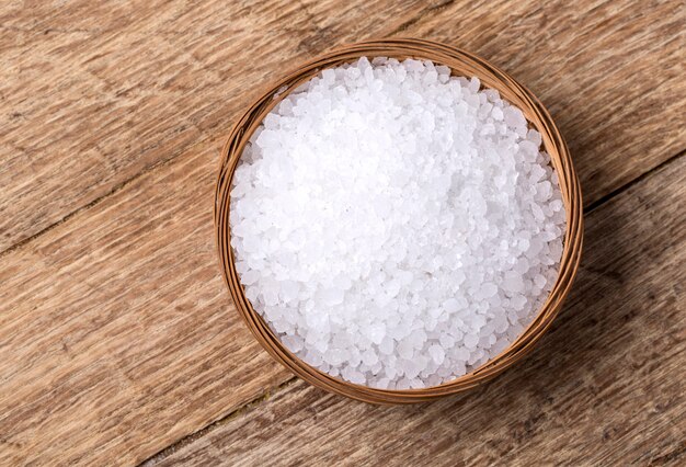 Sea salt in wooden bowl