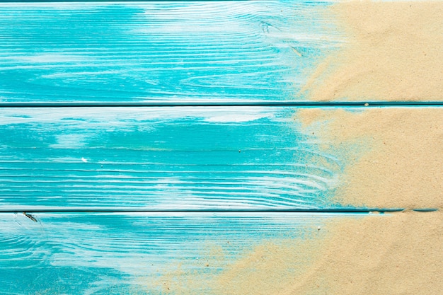 Sea sand on blue wooden floor,Top view with copy space